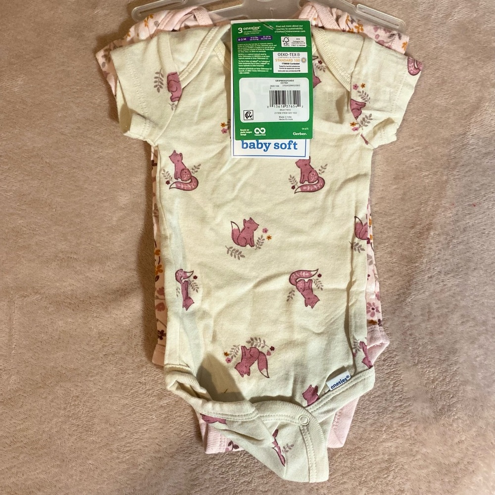 Gerber Baby Onesies in Green and Purple